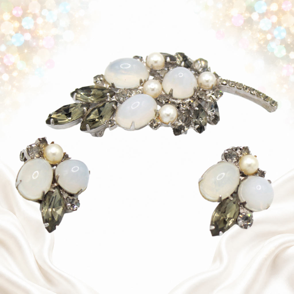 Angled view showing high domed faux opal Lucite cabochons