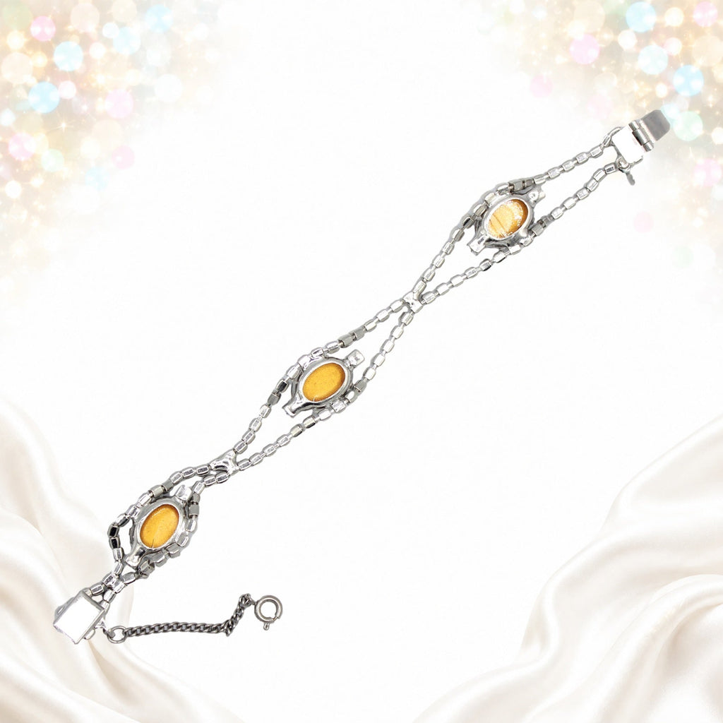 Back view of bracelet with hidden push-in clasp and safety chain