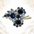 Vintage Juliana blue multi-prong rhinestone brooch, front view