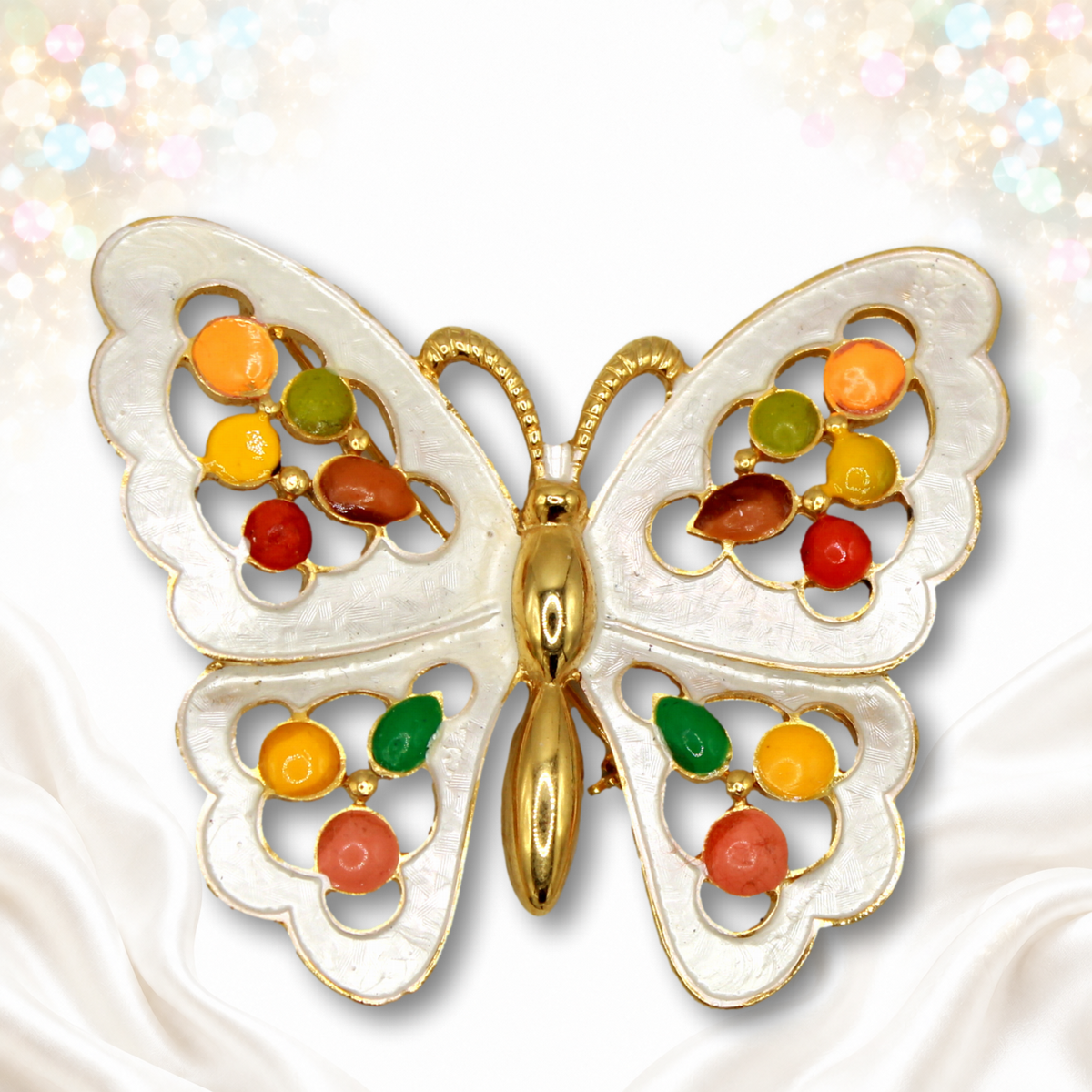 White enamel gold tone Juliana butterfly brooch with bright epoxy dot accents, front