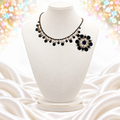 Vintage Juliana dark blue rhinestone scrollwork necklace and matching round brooch on white bust