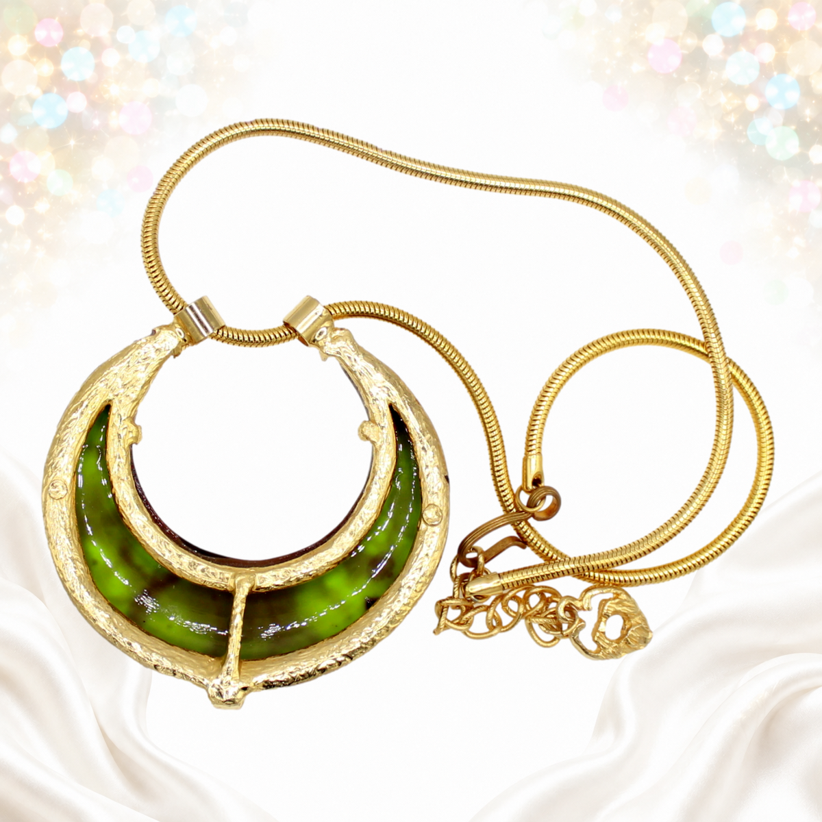 Reverse of Juliana green heat-formed crescent pendant necklace, gold-tone metal framework and clasp