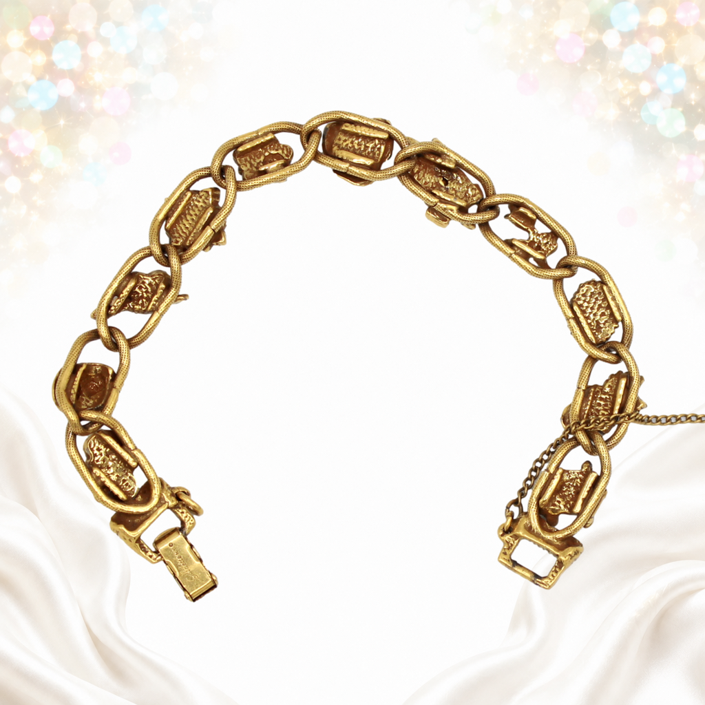 Reverse of the Goldette figural bracelet showing the linked construction and clasp