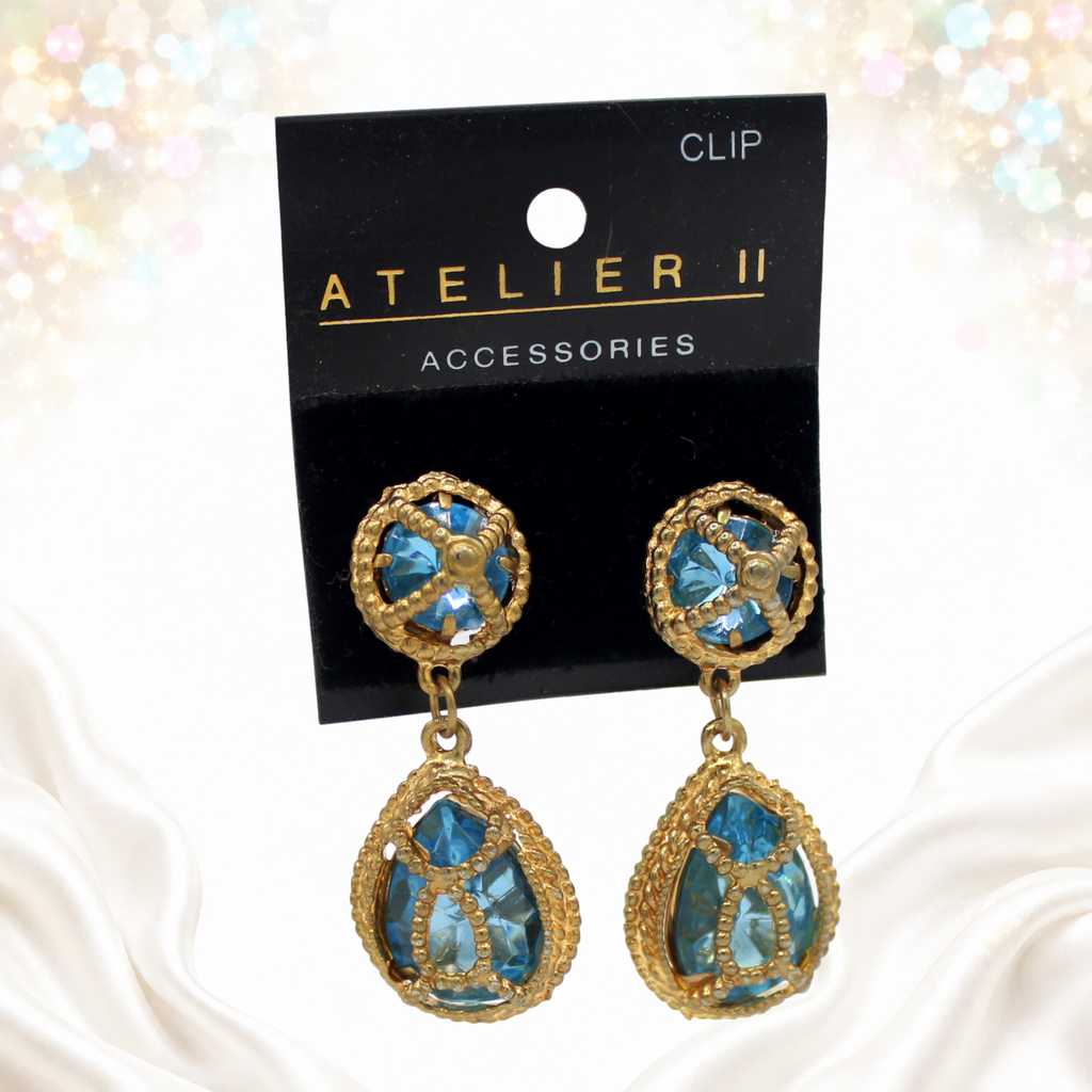 Juliana sky-blue caged earrings on original Atelier II card