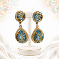 Juliana sky-blue caged clip dangle earrings, front view on stand, IIJJ8519