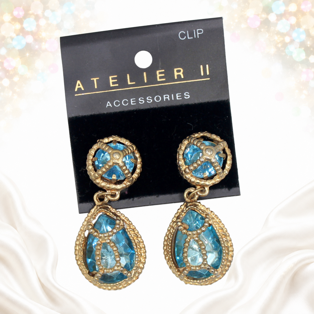 Juliana sky-blue caged earrings on original Atelier II card