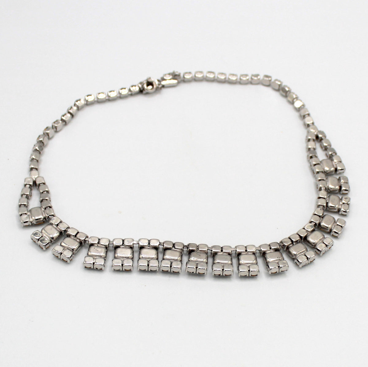 Silver-tone necklace back, push-in clasp and safety chain