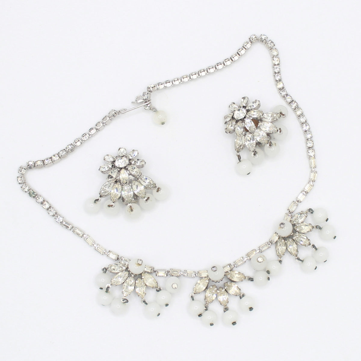 Front detail of Weiss rhinestone white bead necklace and earrings