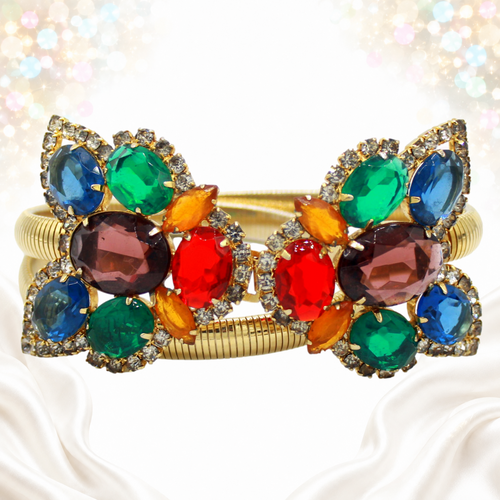 Close-up of multicolor rhinestone ends on Juliana stretch belt