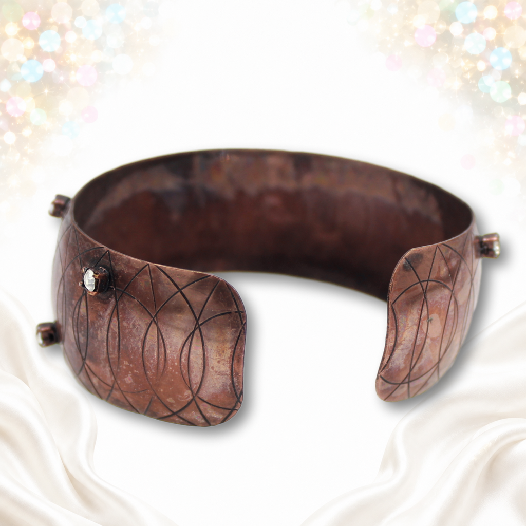 Reverse and open ends of Juliana copper-tone cuff bracelet
