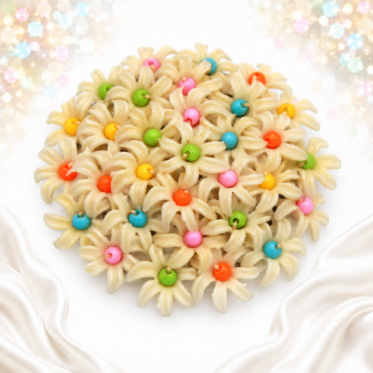 Angled view of plastic daisy flower cluster brooch