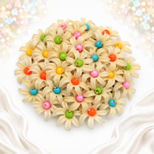 Angled view of plastic daisy flower cluster brooch
