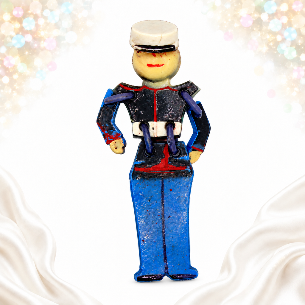 Vintage articulated plastic soldier brooch front view