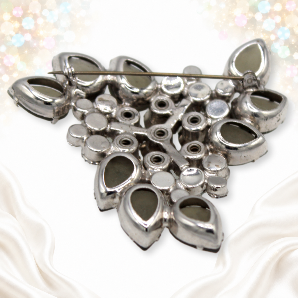 Reverse of vintage Juliana gray pear rhinestone brooch showing cast construction and pin