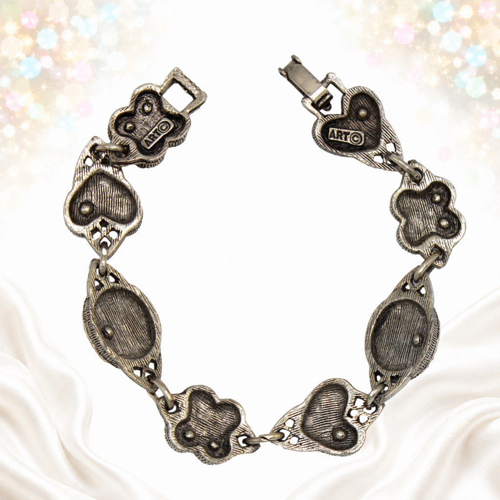 Back and ART CO maker mark on bracelet