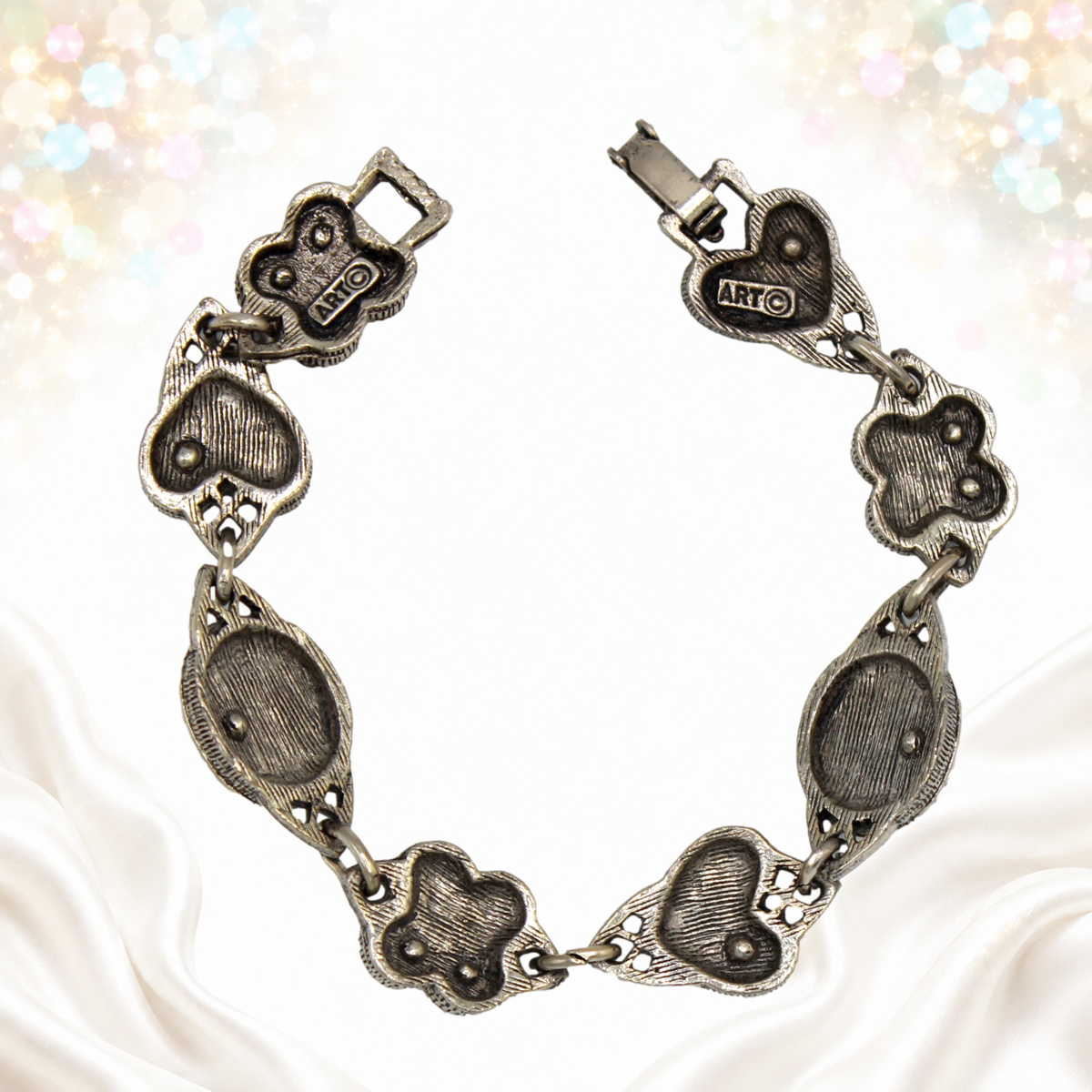 Back and ART CO maker mark on bracelet