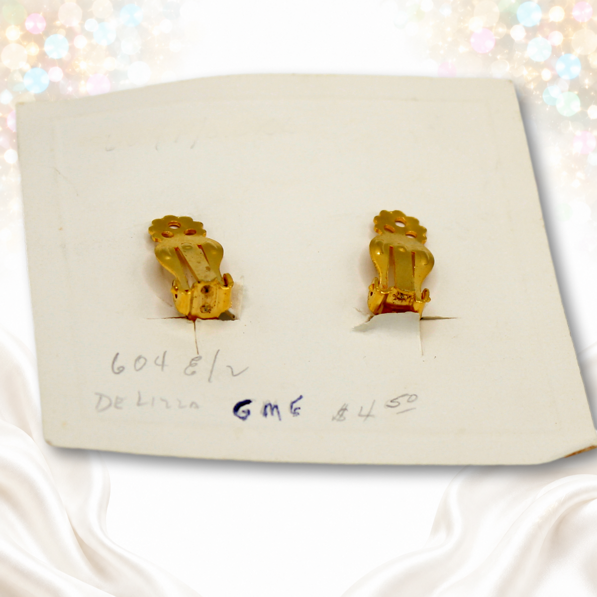 Reverse of original Juliana card showing clip backs for green filigree leaf earrings IIJJ 9784