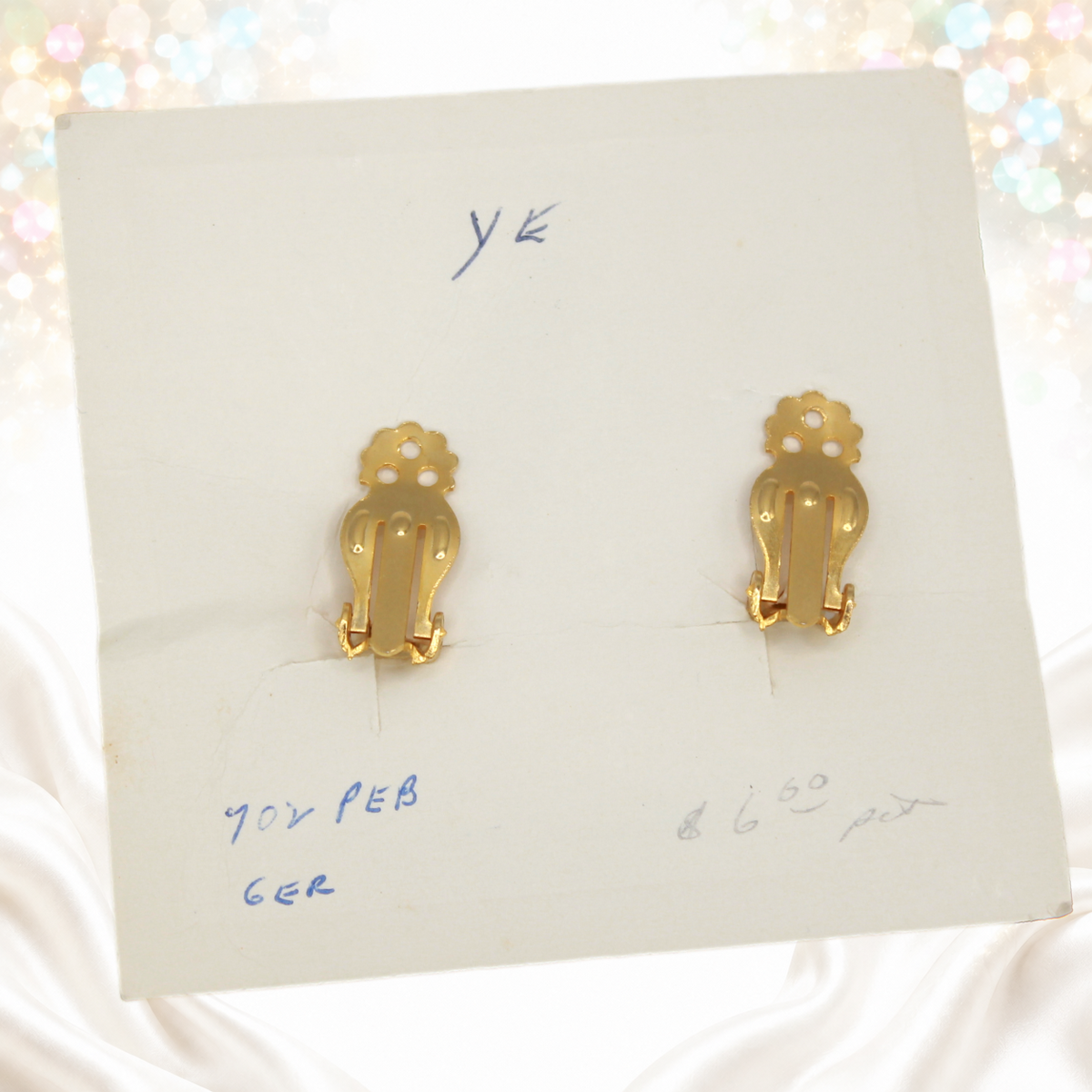 Reverse of original Juliana card showing gold-tone earring clip backs