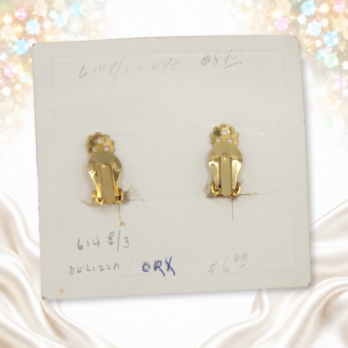 Reverse of original Juliana card showing gold-tone clip backs