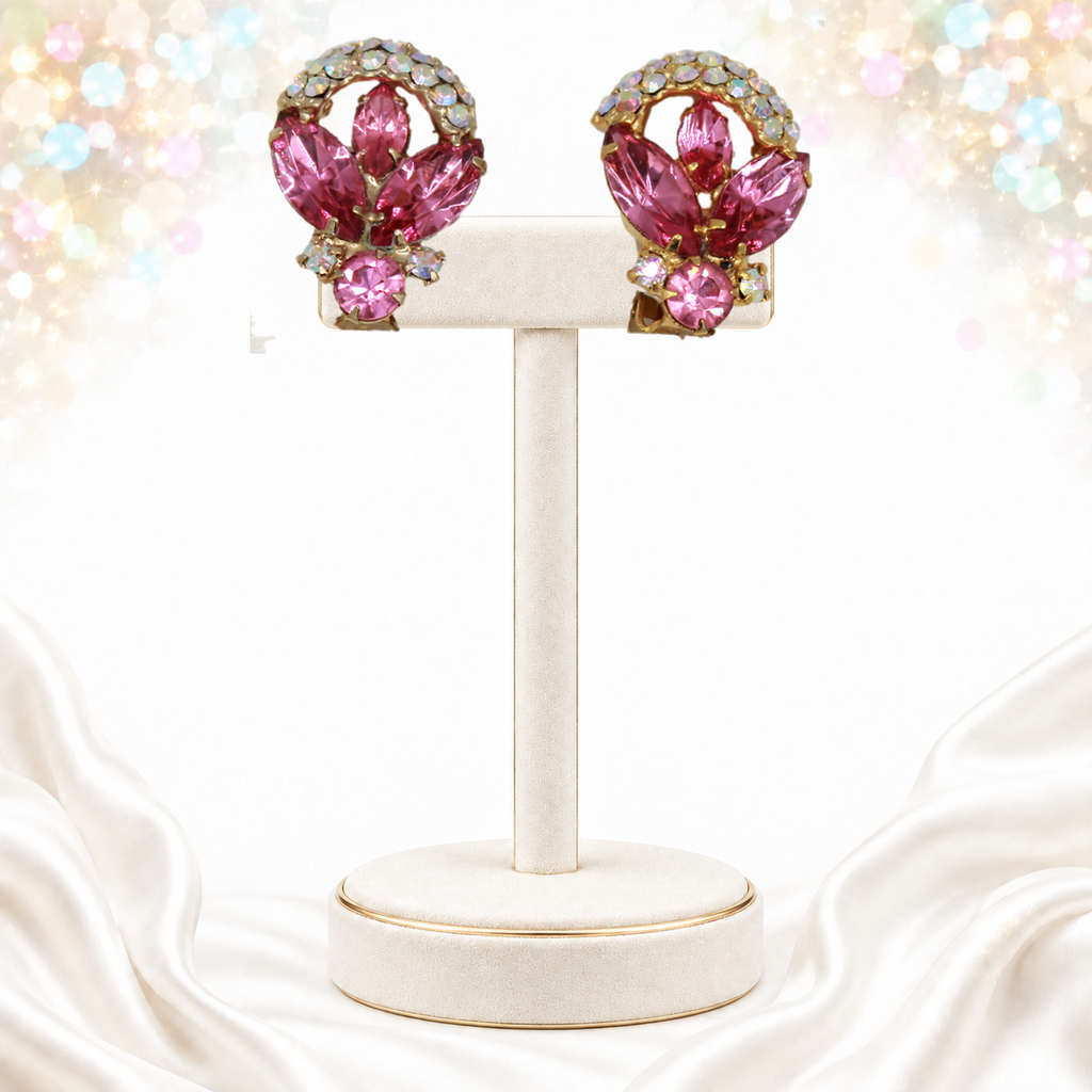 Pink navette and AB chaton Juliana ribbon-family earrings on cream stand