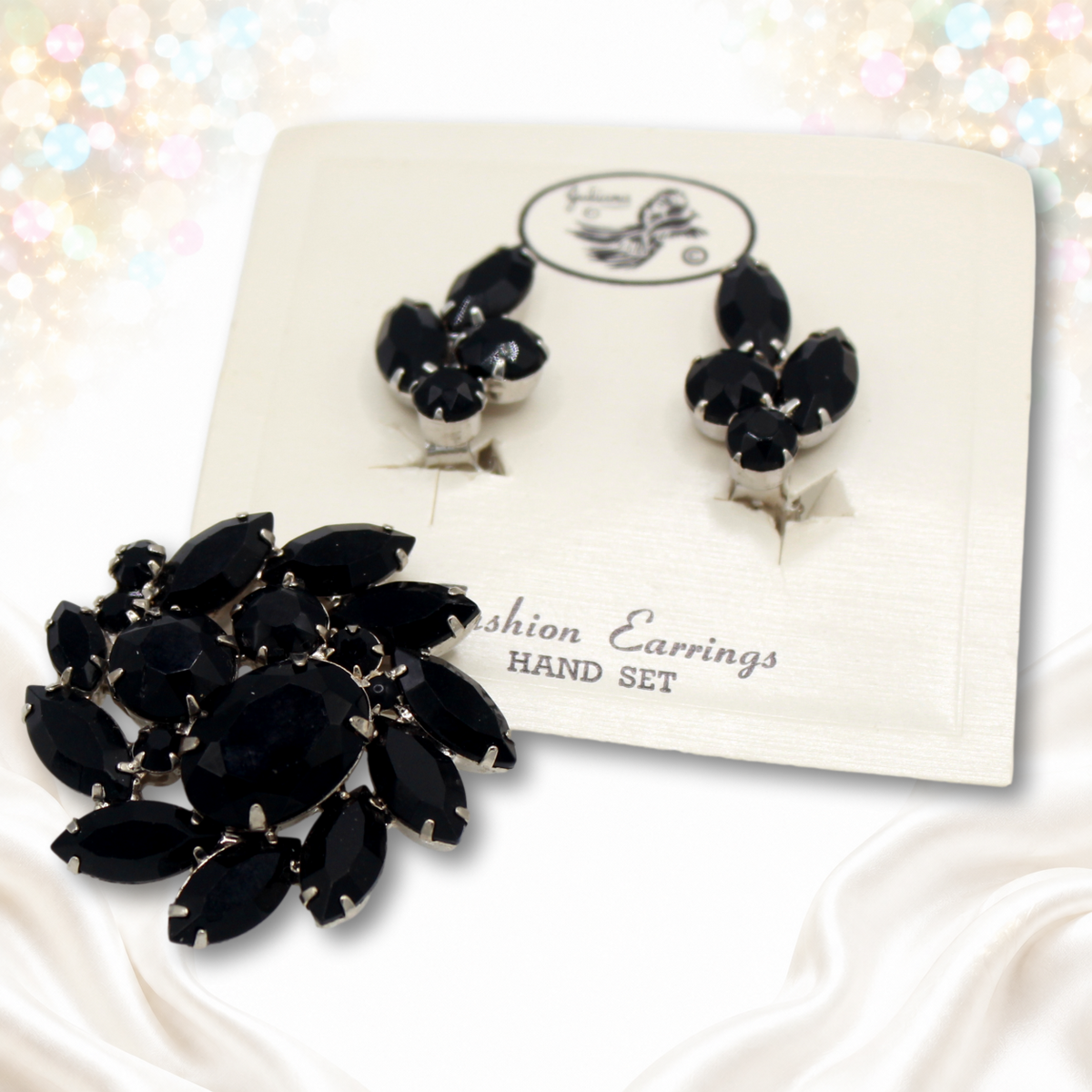 Angled photograph of Juliana black rhinestone brooch and earrings set