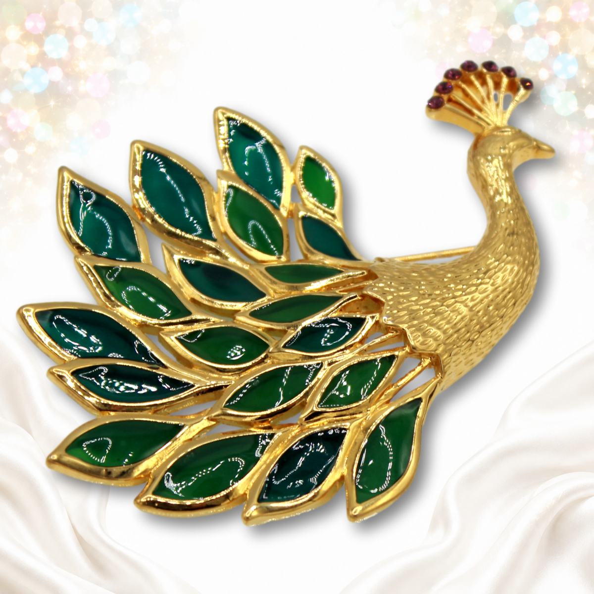 Angled view of Trifari green and teal peacock rhinestone brooch