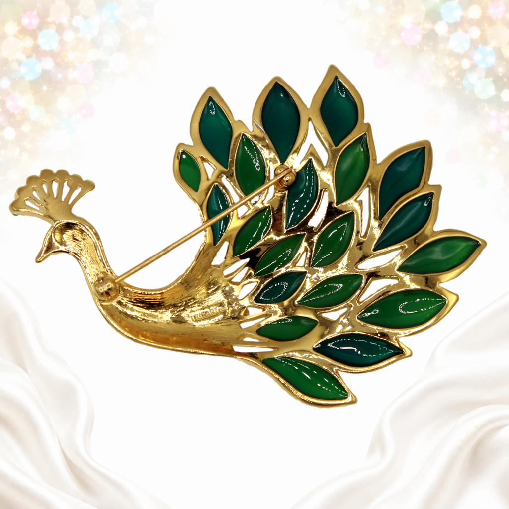 Reverse of peacock brooch showing Trifari signature and pin fastening