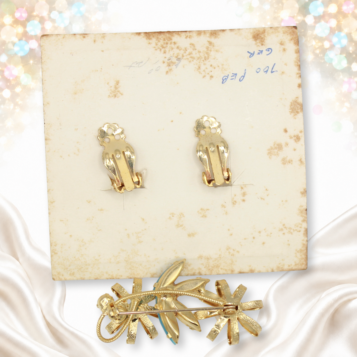 Reverse of Juliana flower brooch and original earring card