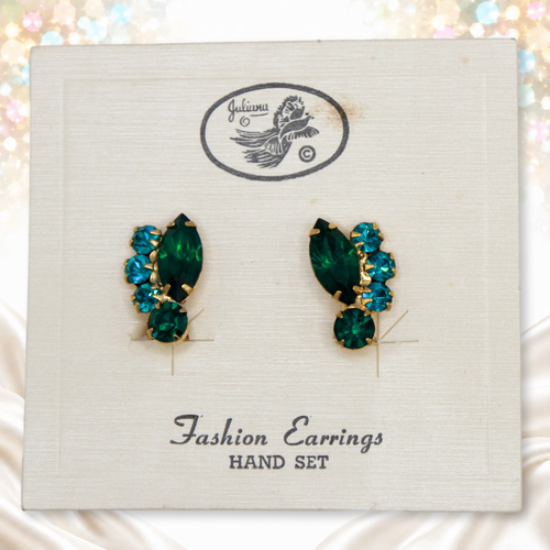 Juliana teal and green rhinestone clip earrings on their original presentation card