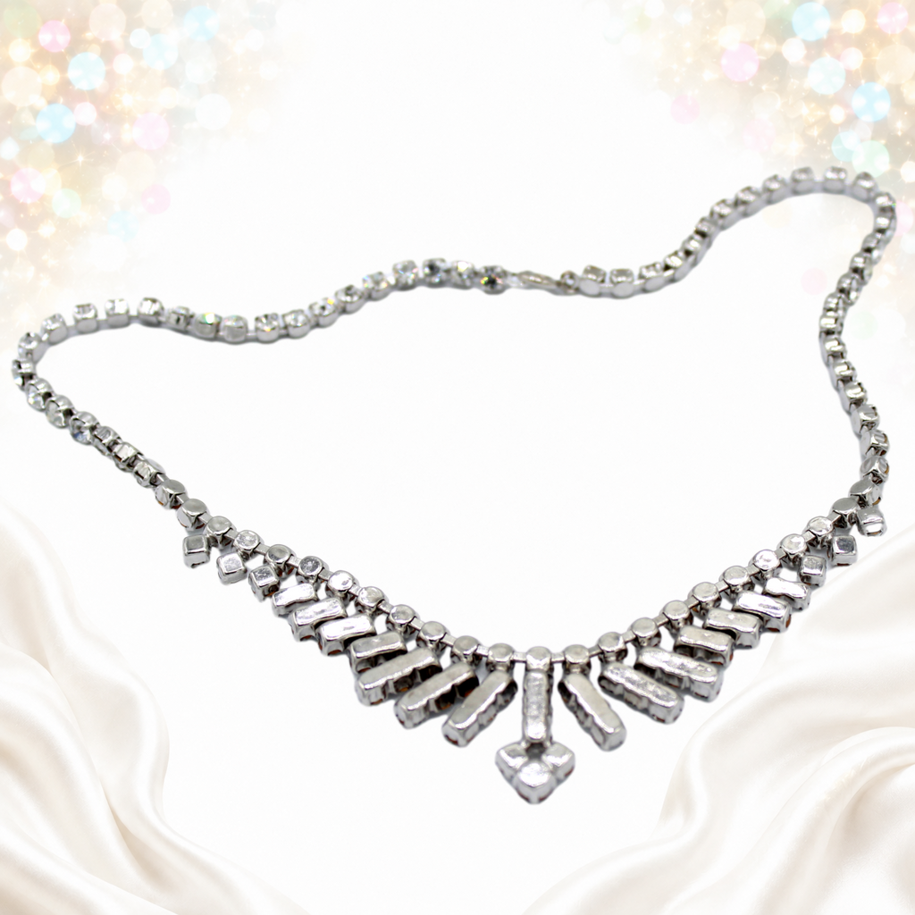 Actual reverse of the silver-tone rhinestone arrow necklace
